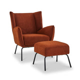 A burnt orange upholstered armchair with a matching ottoman, both with black metal legs, are set against a white background.