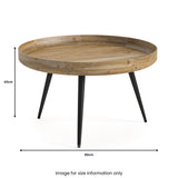 A round wooden coffee table with black metal legs and a raised edge stands isolated. It measures 43cm in height and 80cm in diameter. Text: "Image for size information only".