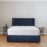 Richmond Ink blue Velvet Ottoman Storage Bed Frame with winged heaboard