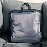 A gray cushioned bag rests on a couch, with the text "Cover Included" displayed below.