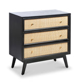 A black wooden dresser with three beige woven drawers, each with a single knob, standing against a white background.