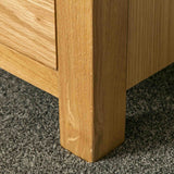 Leg on a London Oak Large Smart TV Stand.